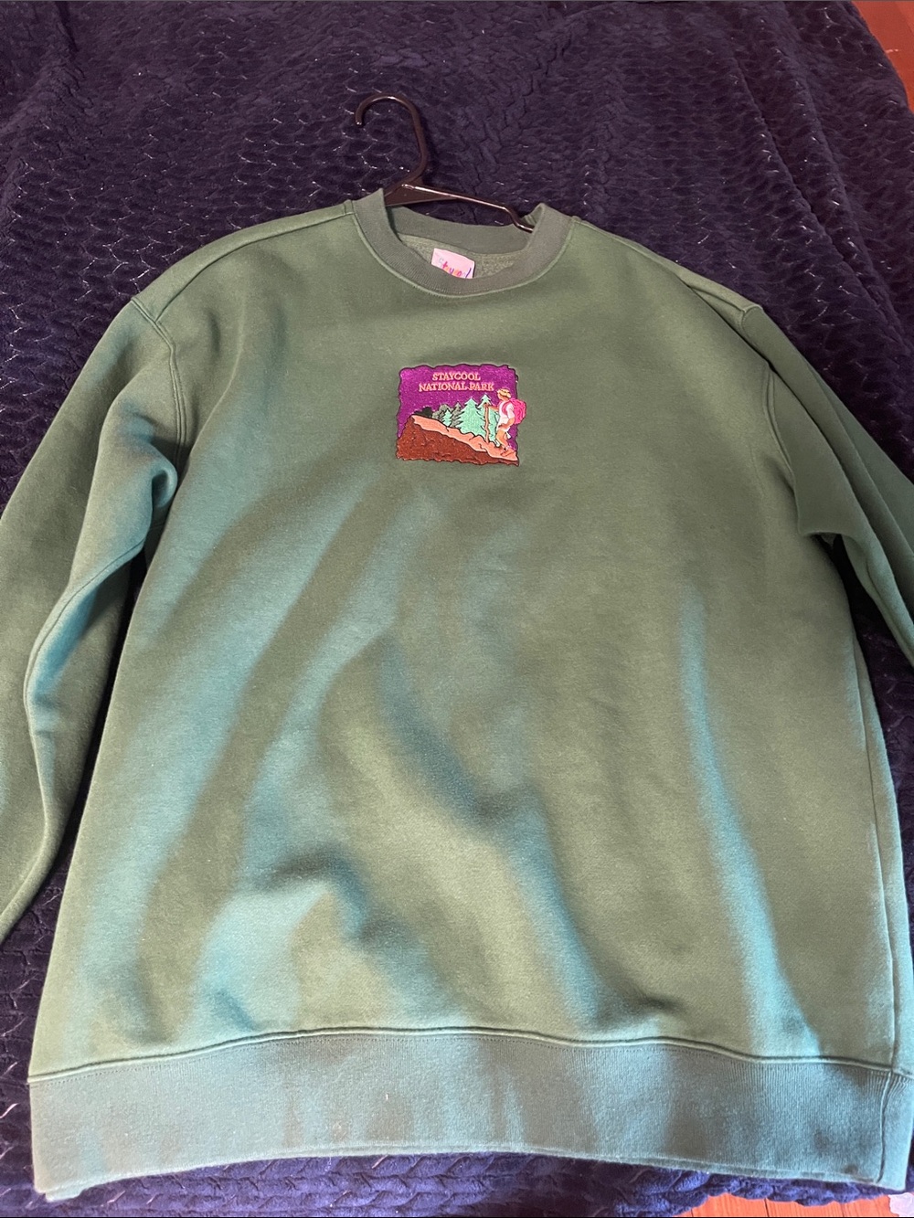 Forest Green Crewneck Sweatshirt with Embroidered Patch